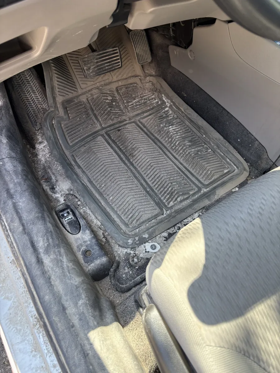 Before driver footwell restoration by JMcKay's Mobile Auto Detailing