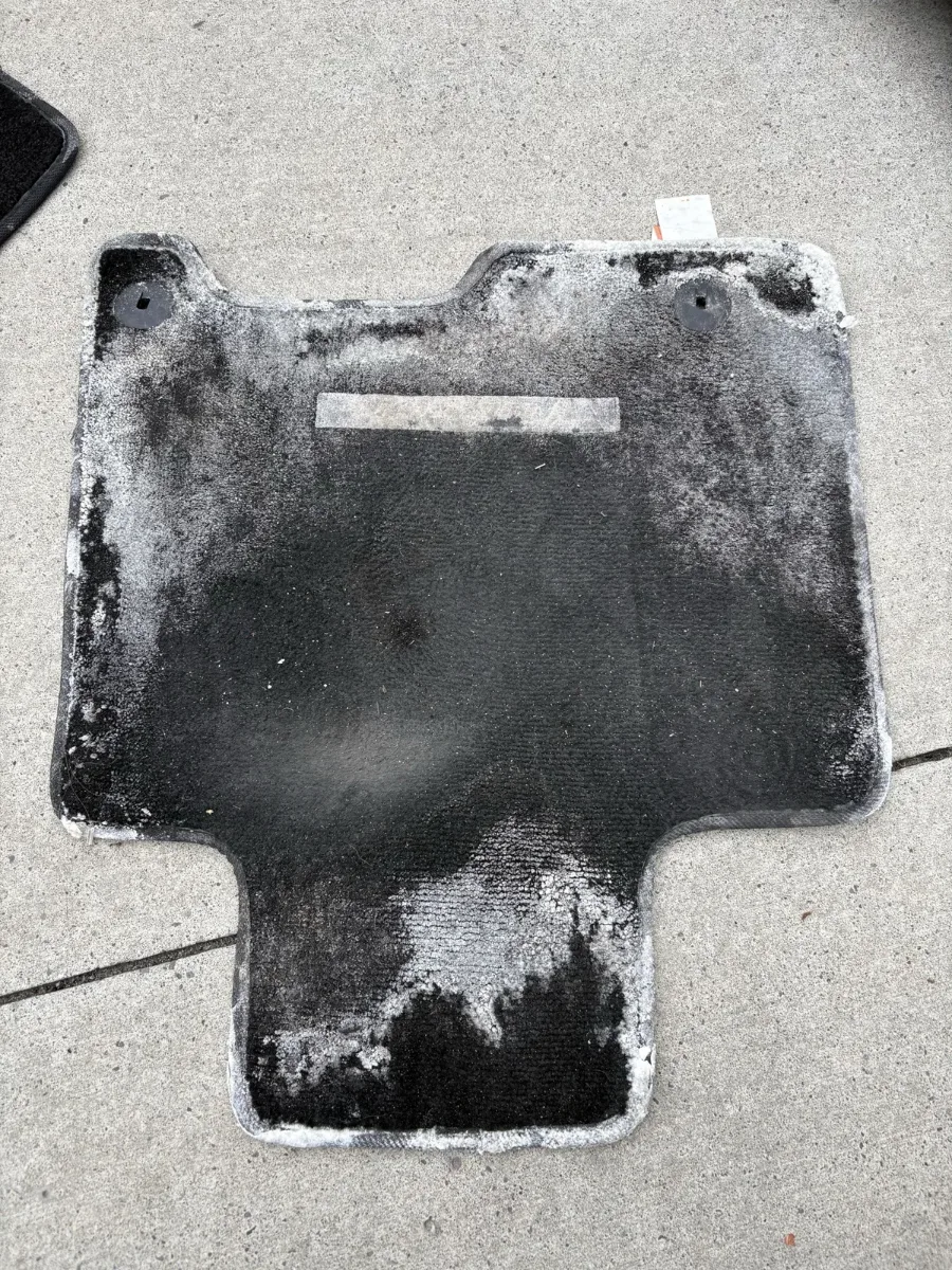 Before heavy salt-stained floor mat by JMcKay's Mobile Auto Detailing